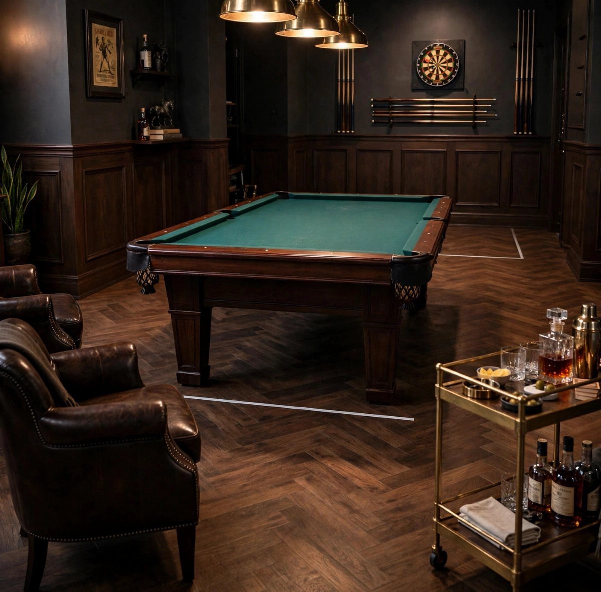 Green felt pool table in a dark wood paneled room with leather chairs.